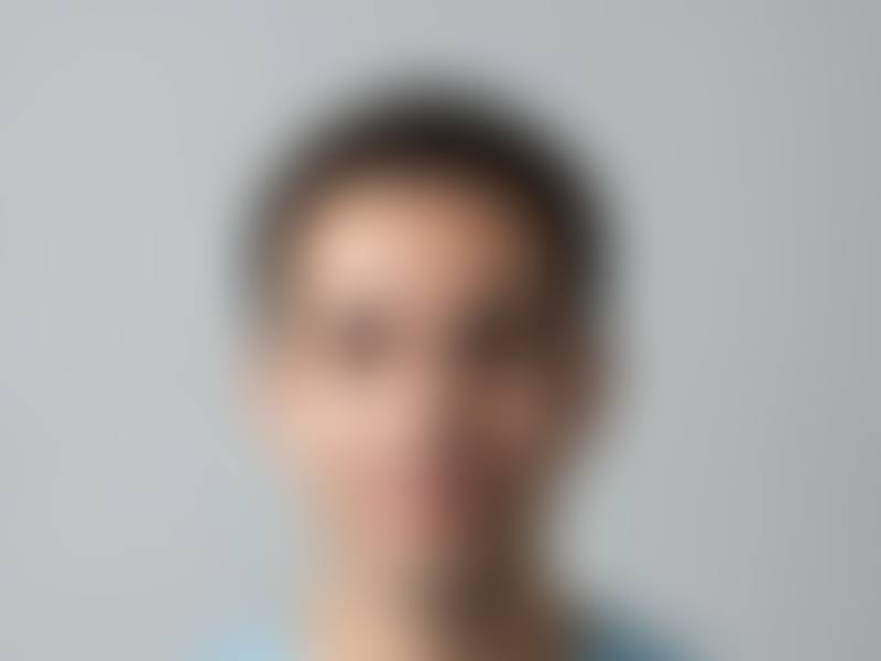 Candidate photo, hidden until verified
