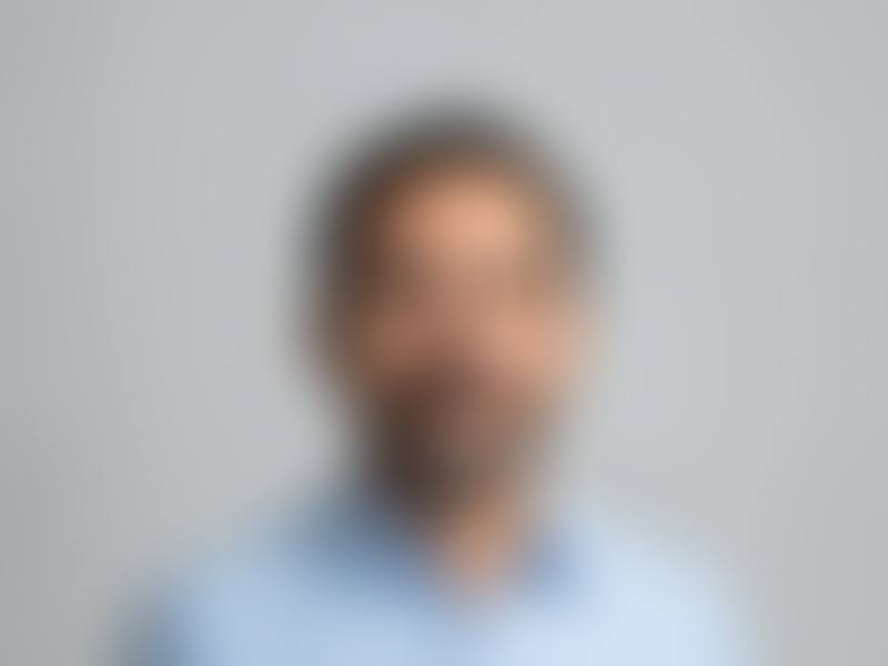 Candidate photo, hidden until verified